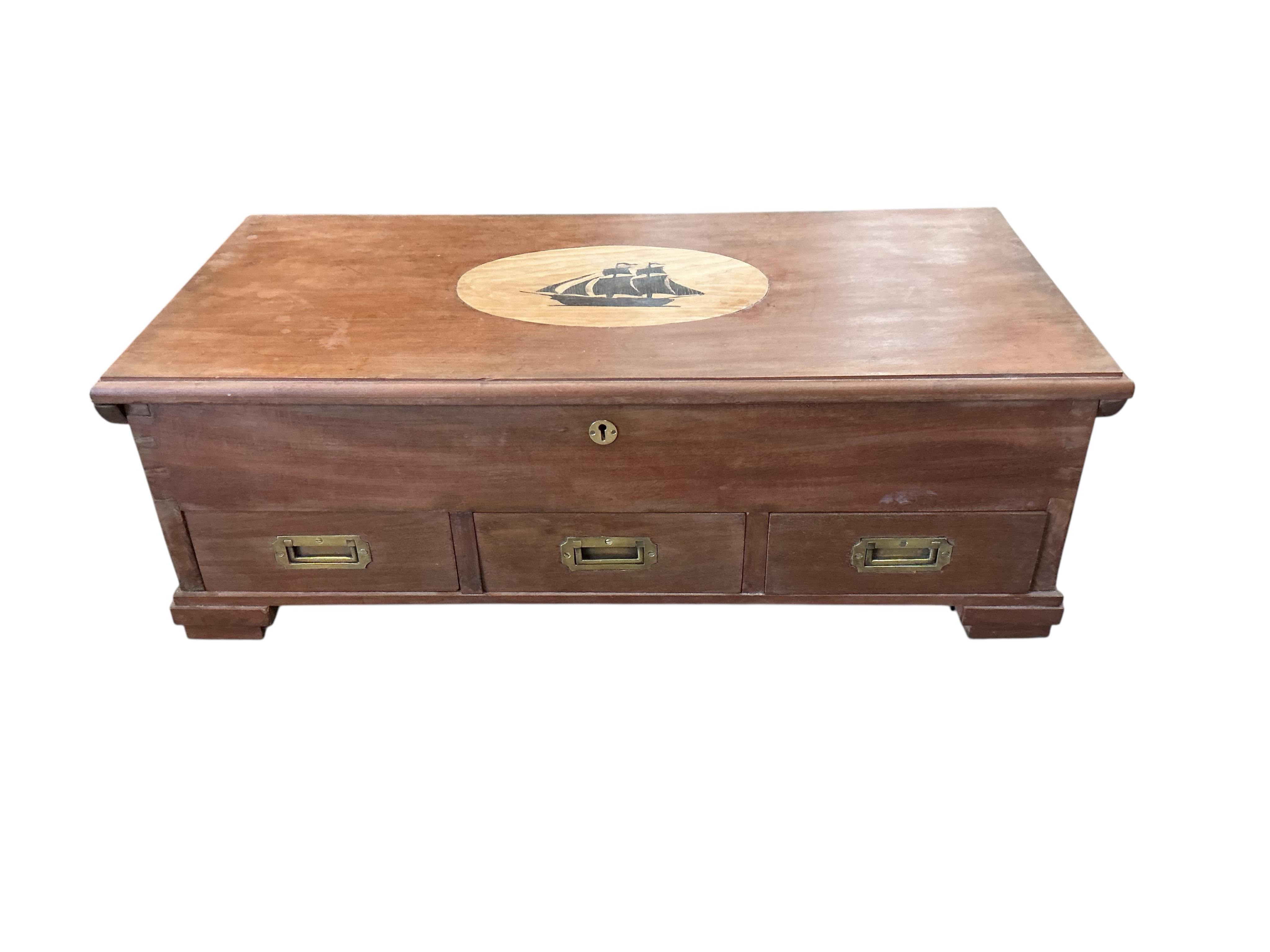 A modern inlaid mahogany three drawer trunk, width 90cm, depth 44cm, height 30cm